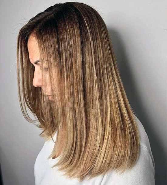 Glossy Caramel Blonde Hairstyle Women