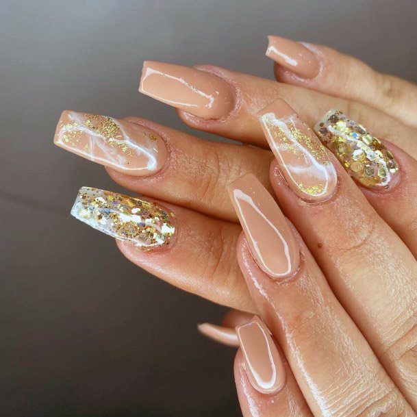Glossy Golden Sparkles On Transparent Nails Women