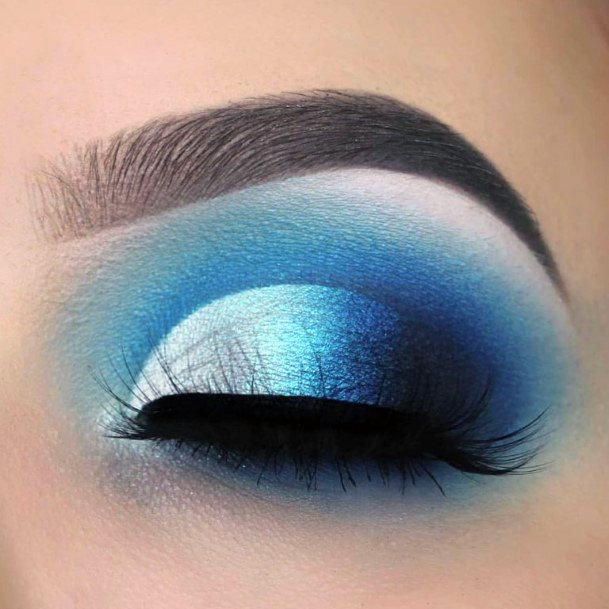 Glowing Blue And Silver Eyeshadow Makeup For Women