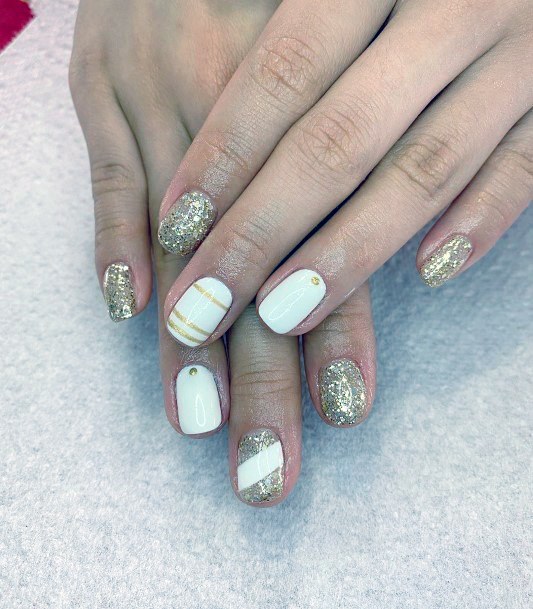 Gold Nails With White Strips