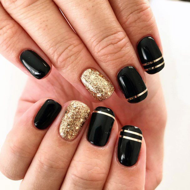 Golden Accent With Black Nails