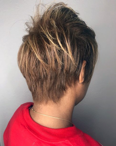 Golden Blonde Edgy Hairstyle With Razor Back Cut For Women