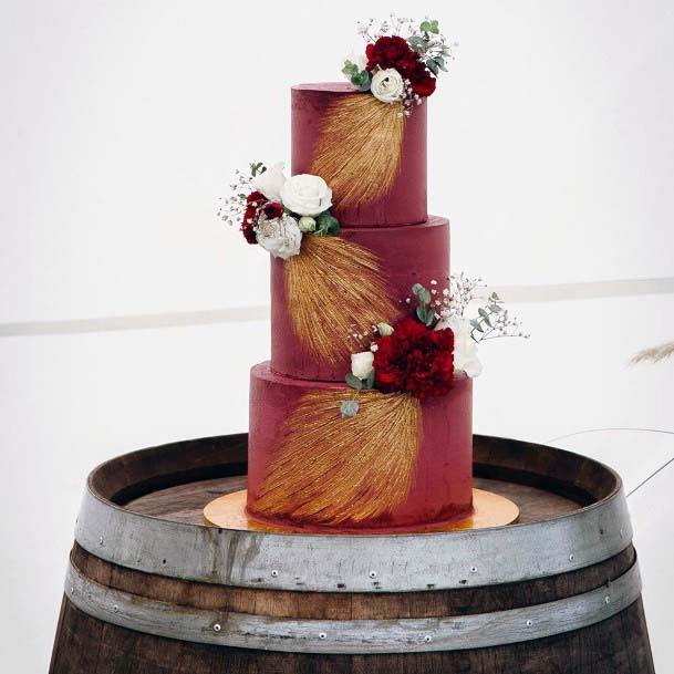 Golden Feather On Burgundy Cake Wedding Decorations