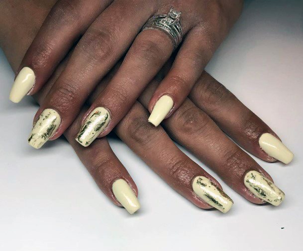 Golden Foils On Pale Yellow Nails For Women