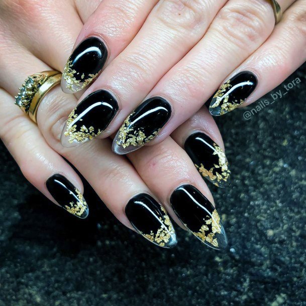Golden Sparkles On Black Transparent Nails For Women