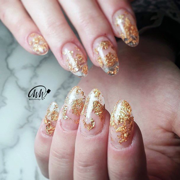 Golden Sparkles On Transparent Nails For Women
