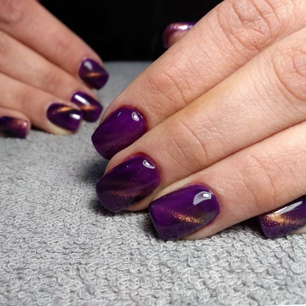 Golden Streaks On Dark Purple Design On Square Nails