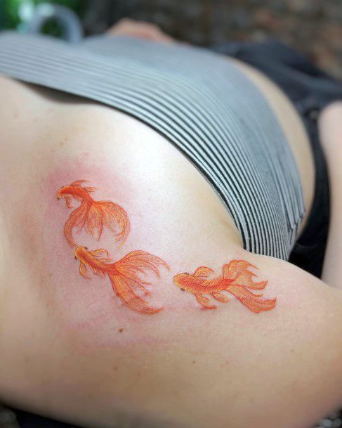 Goldfish Womens Tattoo Designs