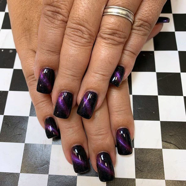 Gorgeous Black And Purple Streak Nail Design For Women