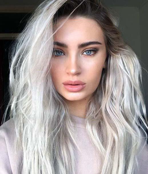 Gorgeous Dark Rooted Ashy Platinum Blonde Layered Wavy Womens Hairstyle