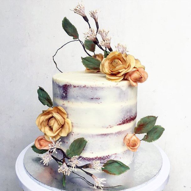 Gorgeous Golden Flowers On Rustic Wedding Cake