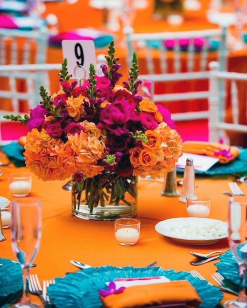 Gorgeous Orange And Pink Table Flowers Mexican Wedding Decorations