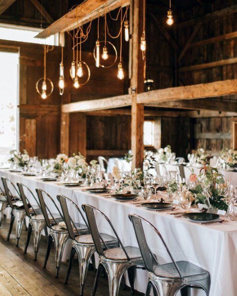 Gorgeous Rustic Barn Wedding Reception Unique Lights Pretty Floral Table Decoration Ideas