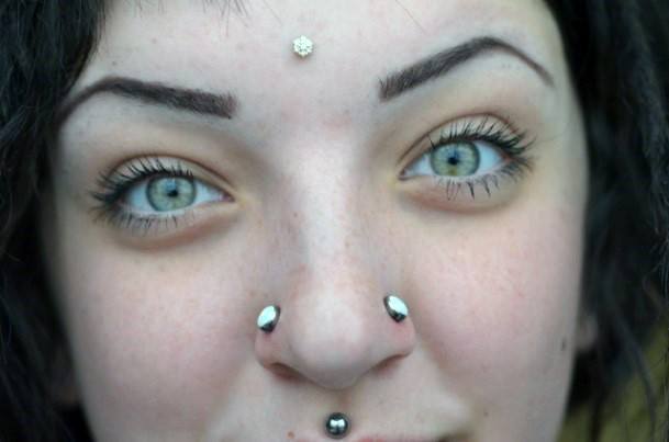 Gorgeous Spiritual Third Eye Dermal Guaged Nasallang And Unique Medusa Facial Piercing Inspiration Ideas For Women