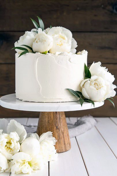 Gorgeous White Flowered Elegant Wedding Cake Women