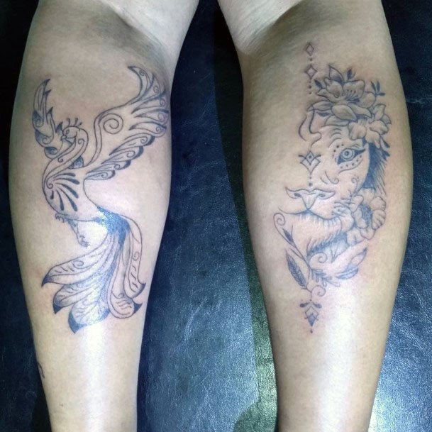 Graceful Peacock And Lion Tattoo Womens Legs
