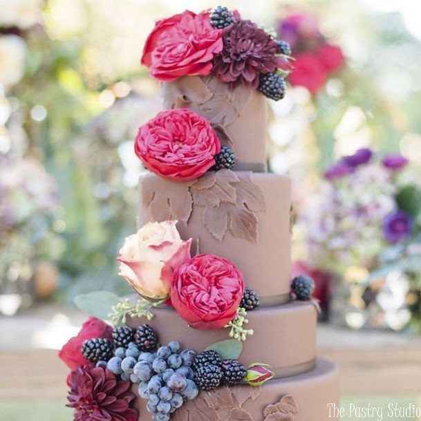 Grand Flowers On Chocolate Wedding Cake