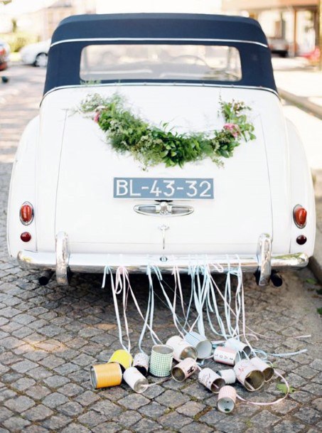 Green Foliage On Car With Tins Wedding Decor