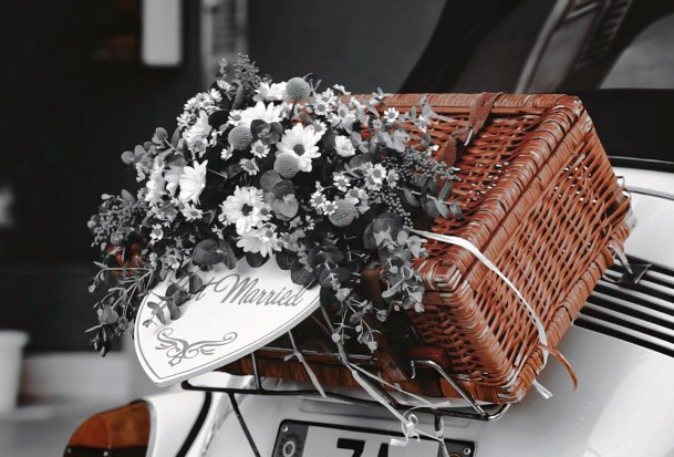 Grey Flowers And Basket Decorations On Wedding Car