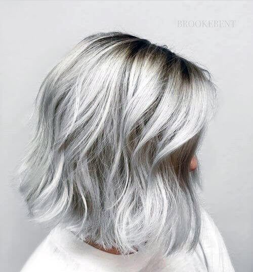 Grey To A Pristine White Color For Mid Length To Long Hairstyles