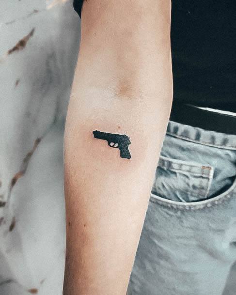 Gun Female Tattoo Designs