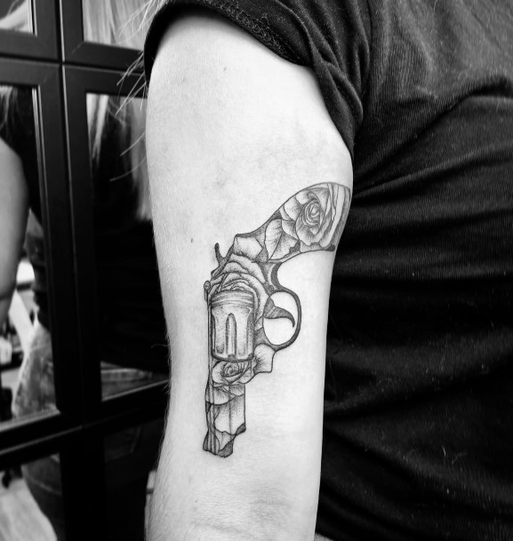 Gun Female Tattoo Designs