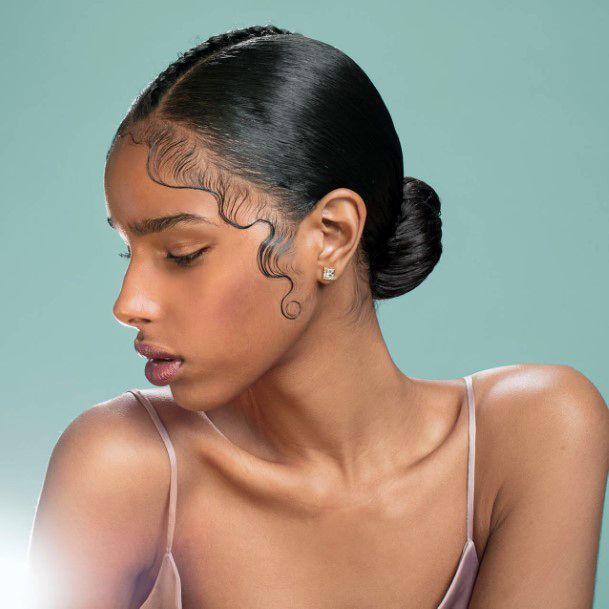 Hairstyles For Black Women Sweet Low Bun Smooth Edges