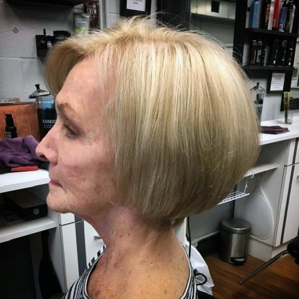 Hairstyles For Older Women Neat Side Part Short Bob