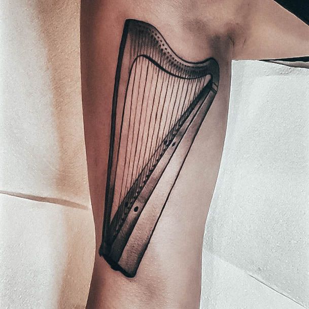 Harp Female Tattoo Designs