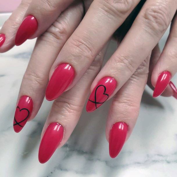 Heart Design On Bright Red Nails For Women