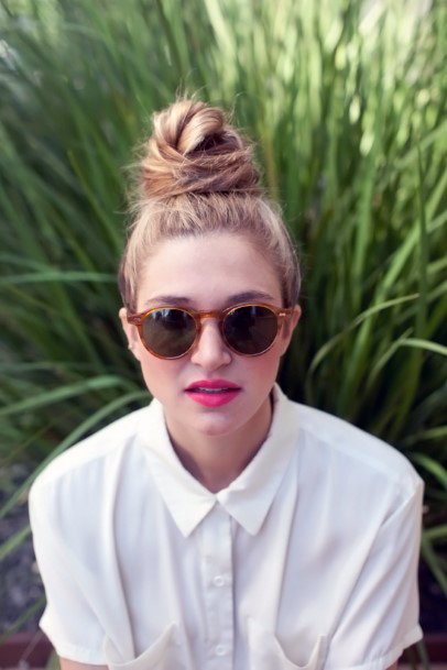 Hipster Woman With Blonde Hair In Top Knot Hairstyles