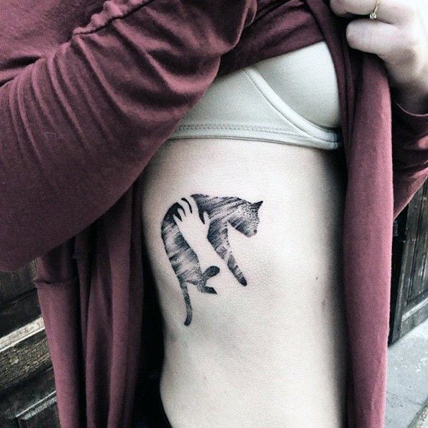 Holding A Cat Tattoo For Women On Torso