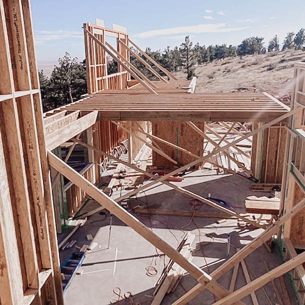 Homebuilding Framing Stage Of A New Custom House As Owner Builder