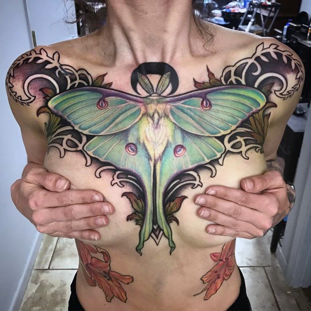 Huge Lighted Firefly Tatttoo Womens Chest