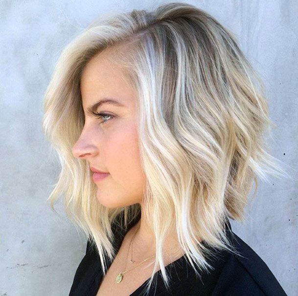 Icy Blonde Female Inverted Shaggy Layered Hairstyle