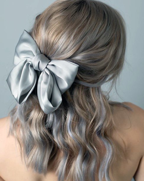 Icy Golden Blonde With Grey Highlights Pulled Into Large Silver Bow