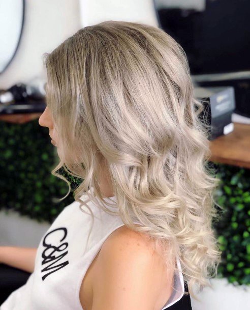 Icy White Blonde Graduating Curls Side Part On Female