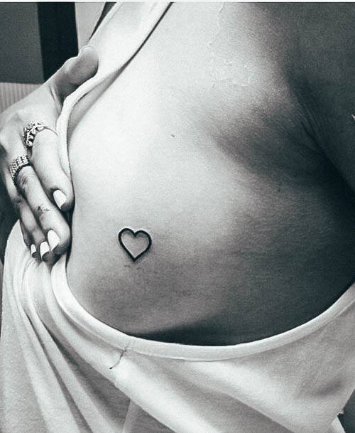 Impressive Ladies Boob Tattoo Tiny Heart