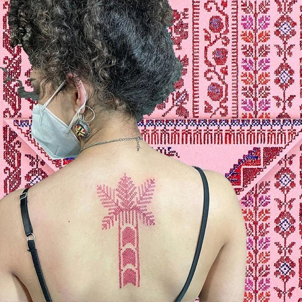 Impressive Ladies Cross Stitch Tattoo