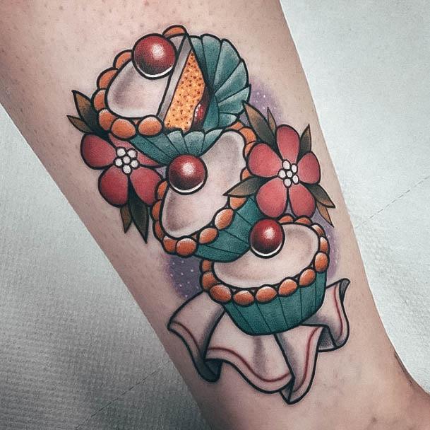 Impressive Ladies Cupcake Tattoo