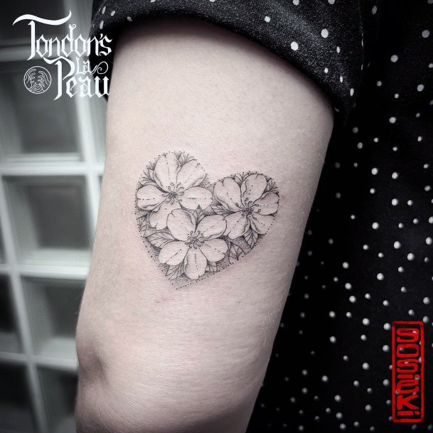 Impressive Ladies Flower Heart Tattoo