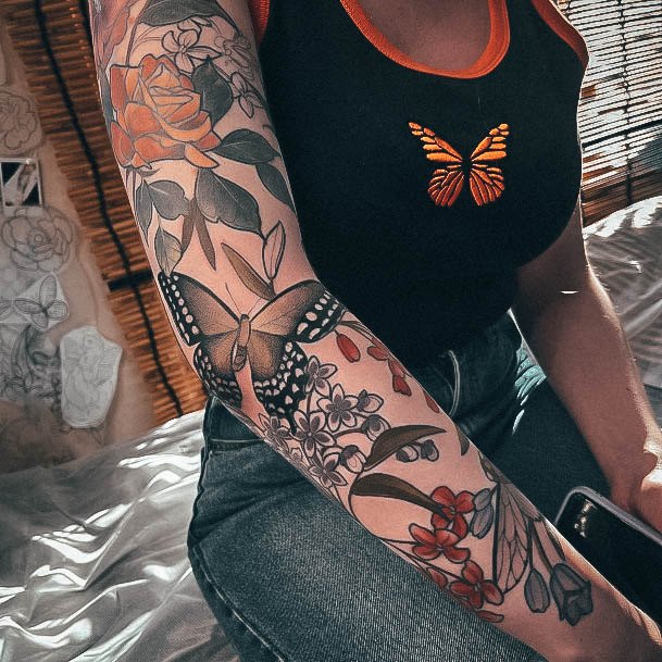 Impressive Ladies Flower Sleeve Tattoo