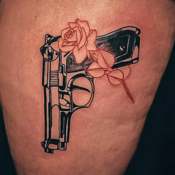 Impressive Ladies Gun Tattoo