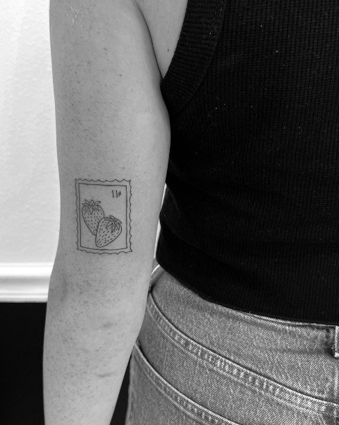 Impressive Ladies Postage Stamp Tattoo