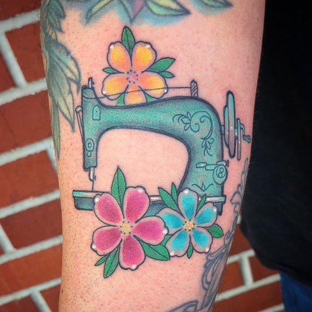 Impressive Ladies Sewing Machine Tattoo