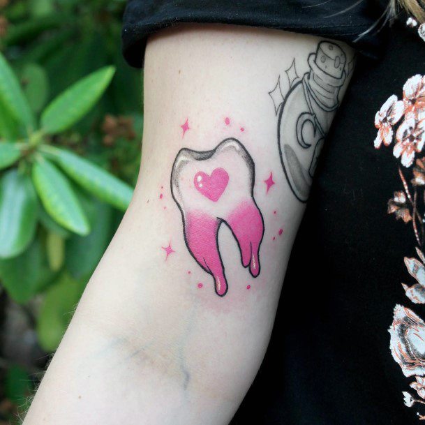 Impressive Ladies Tooth Tattoo