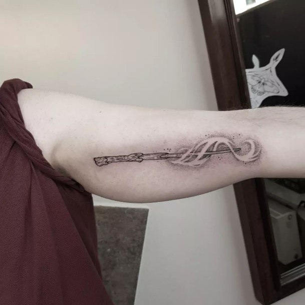 Impressive Ladies Wand Tattoo