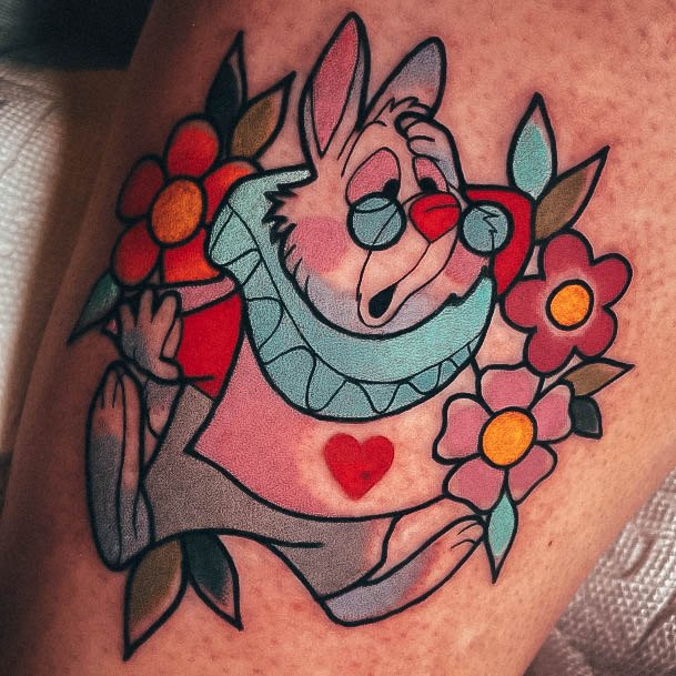 Incredible Alice In Wonderland Tattoo For Ladies