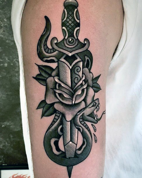 Incredible Dagger Rose Tattoo For Ladies