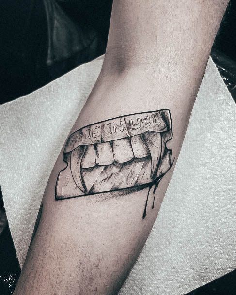 Incredible Fangs Tattoo For Ladies